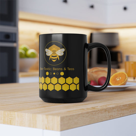 Black mug with bee and honeycomb design on a kitchen counter